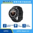 OPPO Watch X2 智慧手錶展示圖，黑色錶身與矽膠錶帶，圓形錶面，標示超過 100 種運動模式、24/7 心率監測與藍寶石玻璃錶面