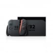 任天堂 Nintendo Switch 2 主機展示圖，黑色主機與底座，左右 Joy-Con 控制器，正面顯示 Switch 2 標誌